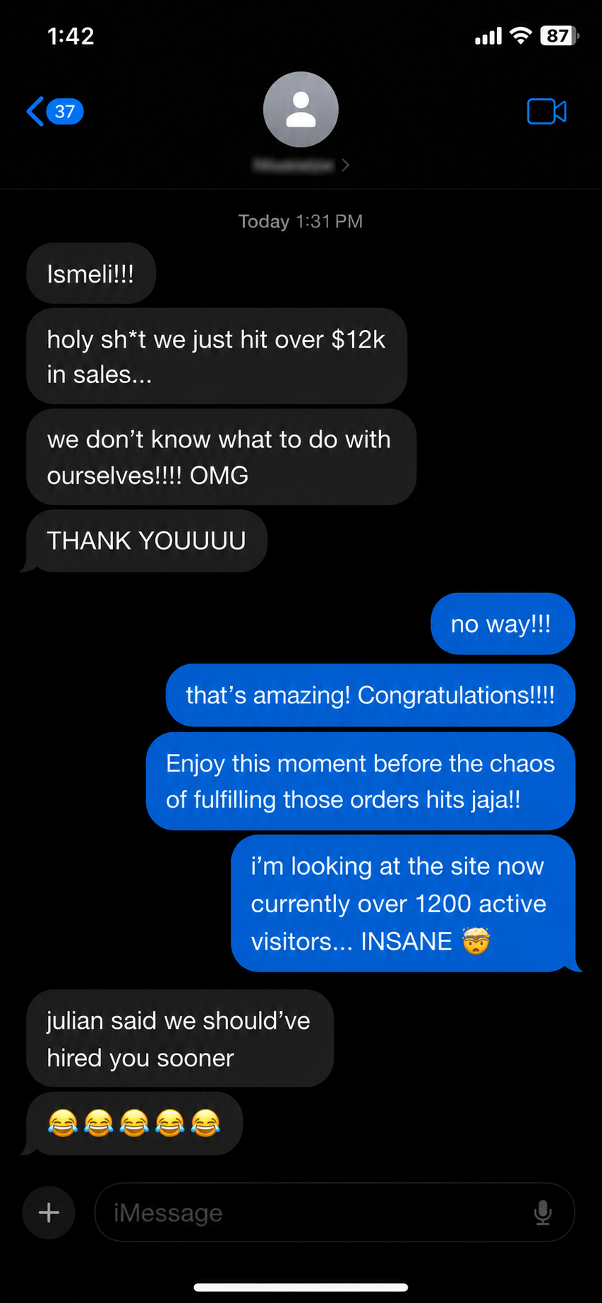 Client text reaction celebrating sales results